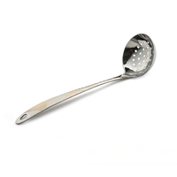 Vague Stainless Steel Ladle with Holes 25 cm Lined Golden & Silver Design - Al Makaan Store