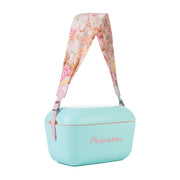 Image description: A pink flower-patterned interchangeable strap for a 20L & 12L cooler box from Polarbox.
