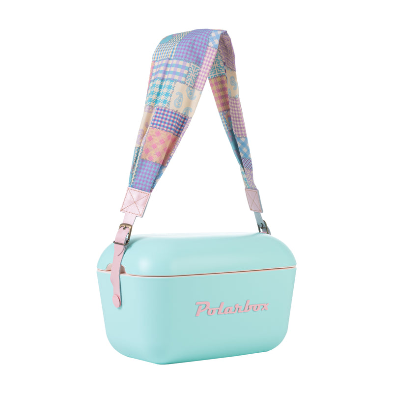 Image of the Polarbox Patchwork Pink Interchangeable Strap. It is a vibrant pink strap designed for the 20L & 12L Cooler Box. The strap is made of high-quality materials and features a beautiful patchwork pattern. It can be easily attached and removed, allowing you to customize your cooler box with a stylish and unique look.