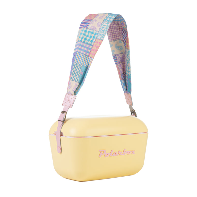 Image of the Polarbox Patchwork Pink Interchangeable Strap. It is a vibrant pink strap designed for the 20L & 12L Cooler Box. The strap is made of high-quality materials and features a beautiful patchwork pattern. It can be easily attached and removed, allowing you to customize your cooler box with a stylish and unique look.